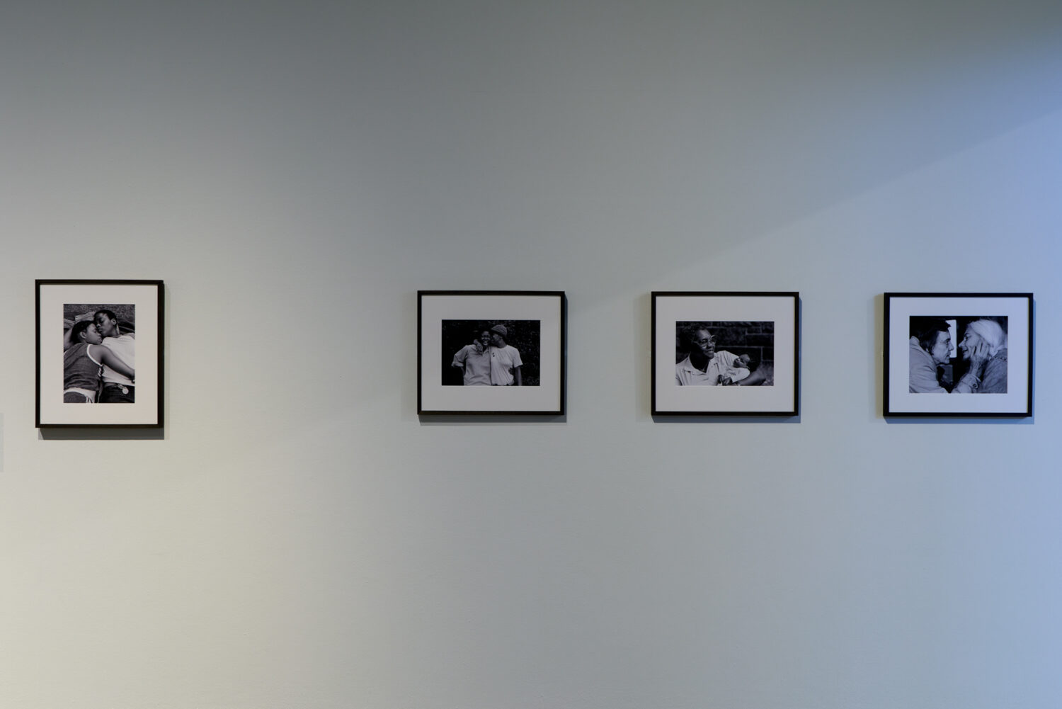 JEB (Joan E. Biren), (L-R) Priscilla and Regina. Brooklyn, New York, 1979, Gloria and Charmaine. Baltimore, Maryland, 1979, Hortense Conner and her granddaughter Tyisha, 1987, Pagan and Kady. Monticello, New York, 1978. © JEB (Joan E. Biren). Ten.8 afterimage exhibition installation shot, The New Art Gallery Walsall in partnership with International Curators Forum (ICF), 2026. Photo: David Rowan.
