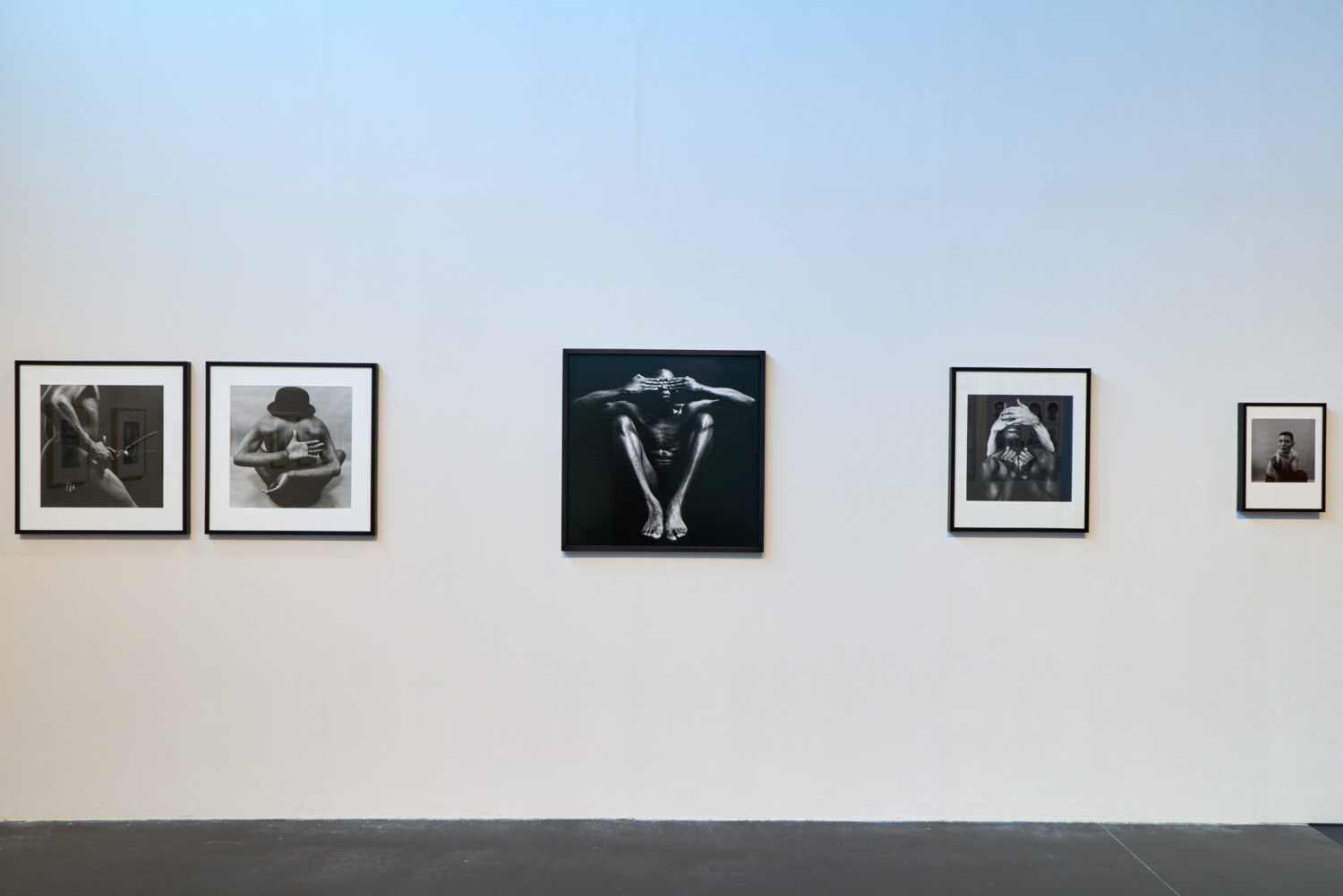 Rotimi Fani-Kayode, (L-R) Untitled (Offering), City Gent, Cargo of Middle Passage, In God we Trust, Untitled, 1980s – 2024. © Rotimi Fani-Kayode, Collection of Autograph, London. Ten.8 afterimage exhibition installation shot, The New Art Gallery Walsall in partnership with International Curators Forum (ICF), 2026. Photo: David Rowan.
