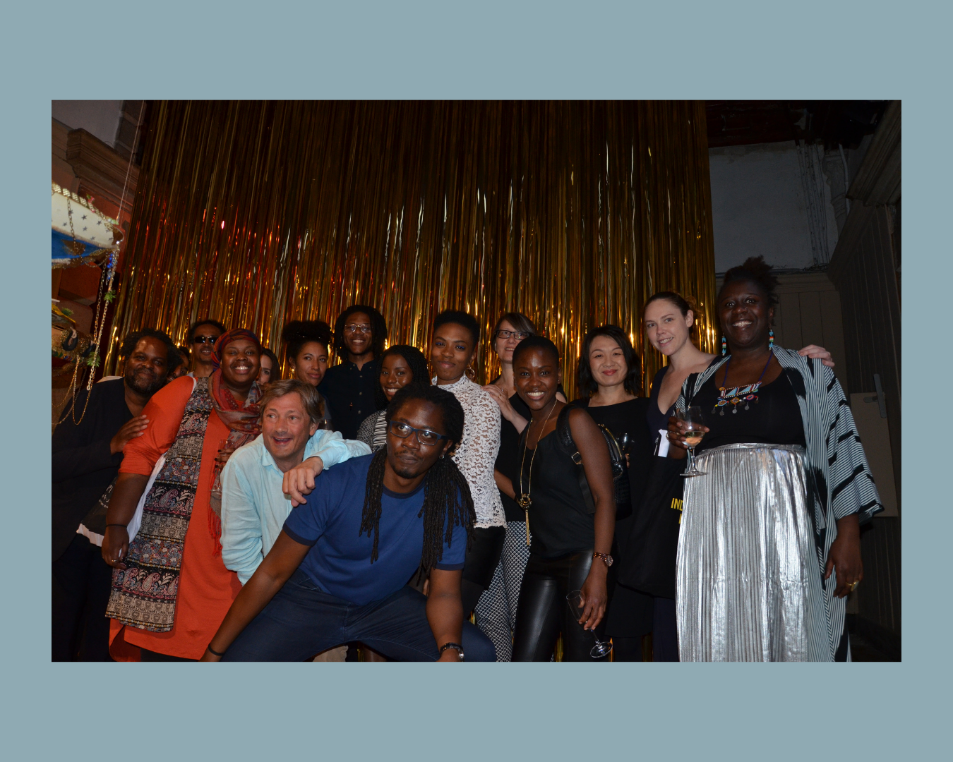 A group photo with artists and curators participating in ICF's 2016-8 Diaspora Pavilion and Beyond the Frame projects at the opening of the 2017 Diaspora Pavilion, curated by Jessica Taylor and David A Bailey, during the 57th Venice Biennale.